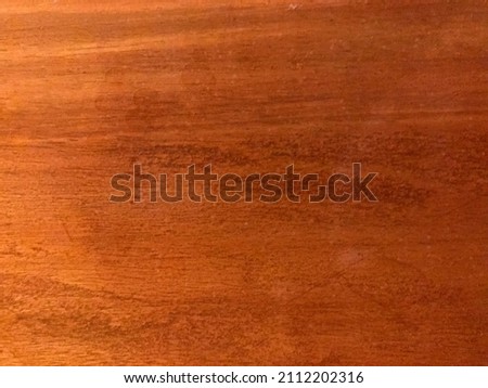 Brown wood panel texture. Closeup photo. Selective focus. Noisy photo. Blurred Photo.