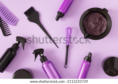 Hair care, styling and coloring products with hair dye tools. Top view, flat lay Royalty-Free Stock Photo #2112233729