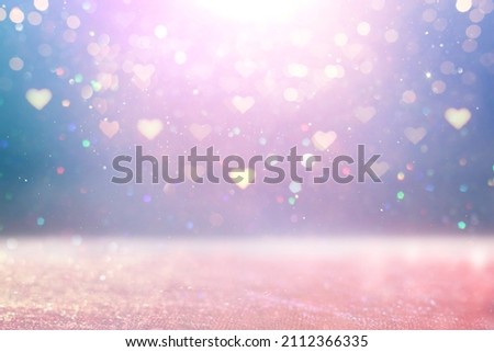 purple and pink glitter vintage lights background. defocused. hearts overlay Royalty-Free Stock Photo #2112366335