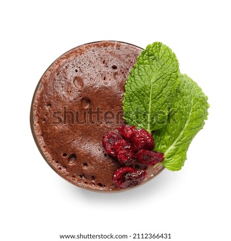 Glass cup with tasty chocolate brownie on white background