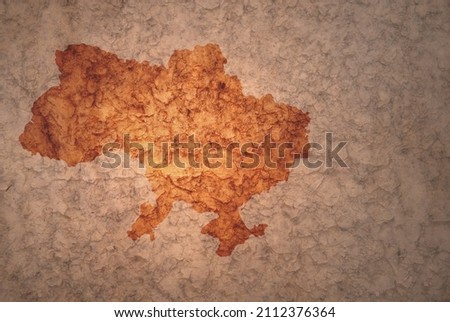 map of ukraine on a old ancient vintage crack paper background