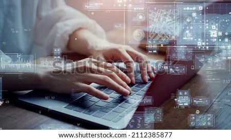 Business and technology concept. Woman typing a keyboard. Digital transformation. Royalty-Free Stock Photo #2112385877