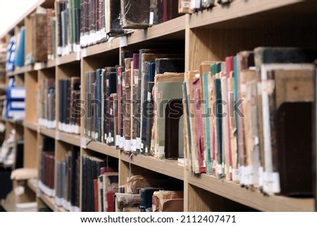 Old, historical books stored in the library
