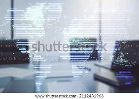Abstract creative world map and modern desktop with computer on background, international trading concept. Multiexposure