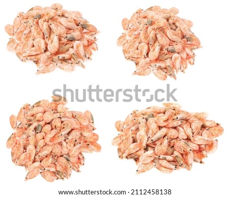 Unpeeled frozen shrimp on a white background