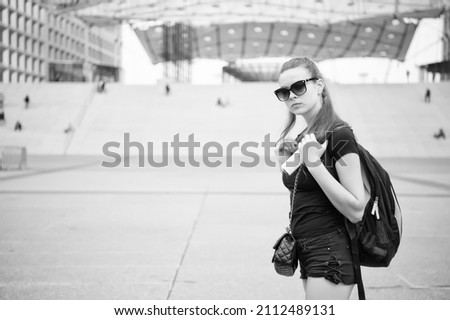 Must visit places check list. Sightseeing tour. Girl tourist sunglasses enjoy city center. Woman urban architecture background. Guide for tourists. Backpacker exploring city. Summer vacation