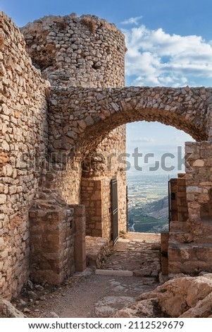Well-preserved ruins of the ancient Greek fortress Larisa with stone walls and towers, Argos, Greece Royalty-Free Stock Photo #2112529679