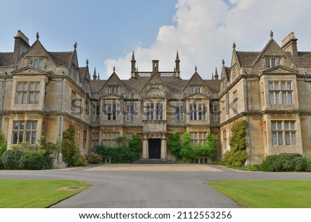 Exterior view of an old English Country Mansion House Royalty-Free Stock Photo #2112553256