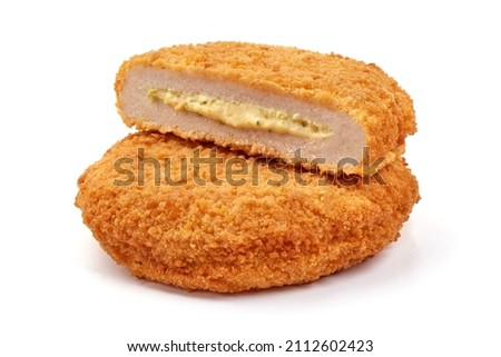 Fried chicken Cordon bleu with cheese in breadcrumbs, isolated on white background Royalty-Free Stock Photo #2112602423