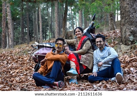 mother and his sons in long trips , this is the way of india family chill out time in winter vacation ,family holiday chill out time with your two wheeler and enjoy .