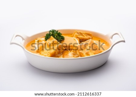 Paneer Butter Masala or Cheese Cottage Curry  Royalty-Free Stock Photo #2112616337