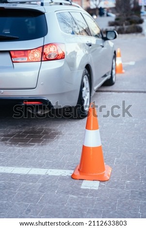 Driving Test. Training parking, practice a skill. Cones for the examination, driving school concept.