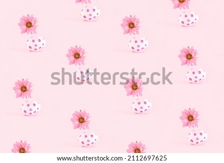 Cute pastel pink pattern. Minimal Easter concept, eggshells and daisy flowers. 