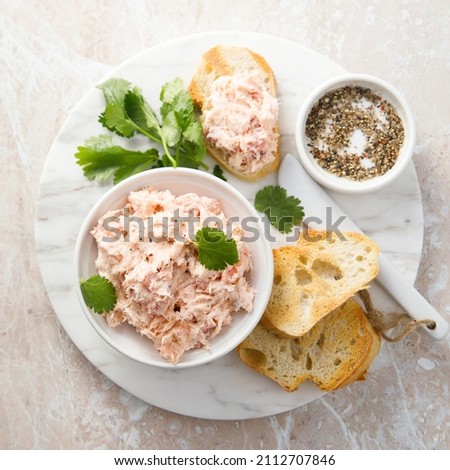 Traditional homemade salmon pate with baguette bread
