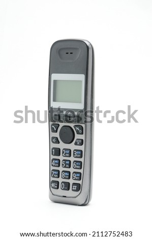 Cordless radiotelephone on an isolated white background Royalty-Free Stock Photo #2112752483