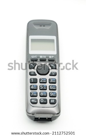 Cordless radiotelephone on an isolated white background Royalty-Free Stock Photo #2112752501