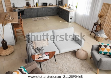 Interior of stylish studio apartment Royalty-Free Stock Photo #2112890468