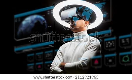 future technology, augmented reality and cyberspace concept - man vr glasses under white illumination with virtual screens projection over black background
