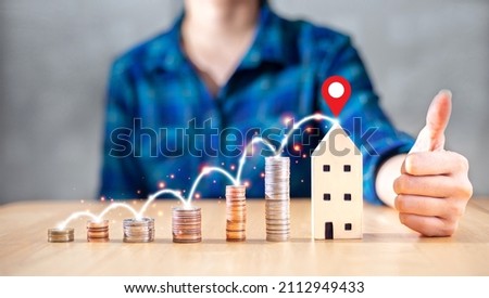 money saving growing from salary to buy house for family home with good location with concept of happy property real estate agent and life management business Royalty-Free Stock Photo #2112949433