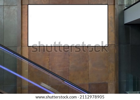 Large landscape billboard poster ad space ideal for visual communication with target audience customer beside a escalator