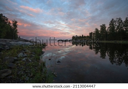 Evening by the lake. A trip to the islands of Lake Ladoga. Karelia