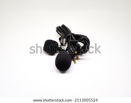 black dual lavalier microphone isolated in white background