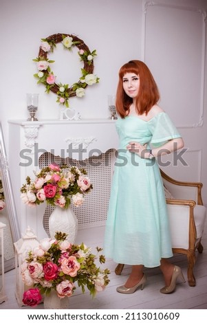 beautiful girl posing in a photo studio
