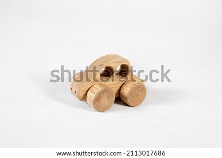 baby toy wooden car old looking on white background