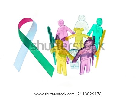 Rare Disease Day Background. Colorful awareness ribbon with group of people with rare diseases. Royalty-Free Stock Photo #2113026176