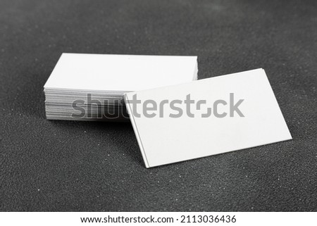 Photos of business cards. Mock-up for corporate identity on a black background. For graphic designers presentations and portfolios