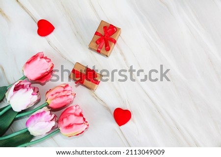 pink tulips and gift box