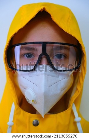 Coronavirus. A doctor in a medical mask and glasses. A girl in a protective mask and glasses. The girl is concerned about a viral pandemic disease. Protected.
