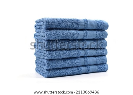 6 Pack Folded Light Blue Salon Towel in White Background Royalty-Free Stock Photo #2113069436