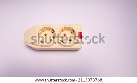 Extension cord with two outlets isolated on white background. Portable power socket