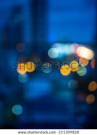 Abstract circular bokeh background of the night city with blurred lights
