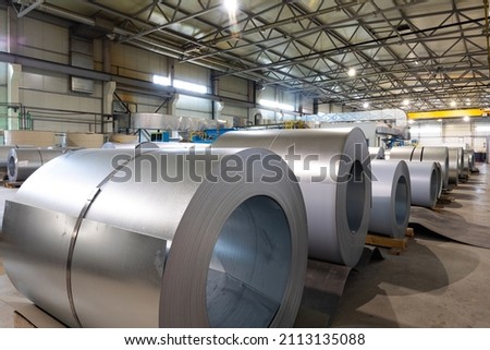 Metal tile for roof in metallic forming machine production line in factory. Cold rolled steel coils at the plant. Industrial concept
