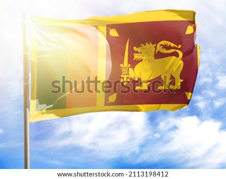 Flagpole with flag of Sri Lanka.