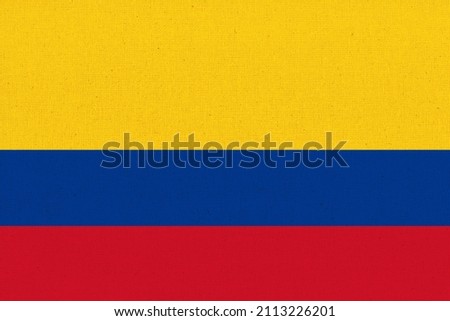 Flag of Colombia. Colombian flag on fabric surface. Colombian national flag on textured background. Fabric Texture. Colombian country. Republic of Colombia