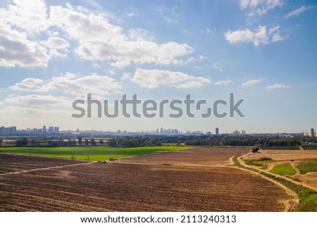 Rustic autumn landscape blue sky white clouds Royalty-Free Stock Photo #2113240313