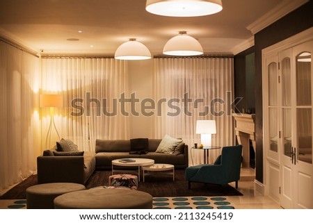 Illuminated domed lights over home showcase living room Royalty-Free Stock Photo #2113245419