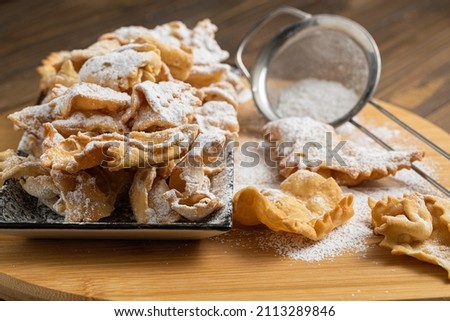 Bugie and riccioline a Traditional sweet crisp pastry for italian carnival, angel wings