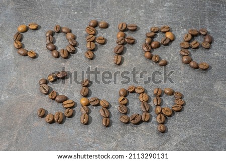 Roasted coffee beans texture background. Coffee beans background. Background from roasted coffee beans. Close-up