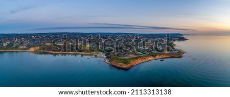 Aerial view of Daveys Bay Yacht Club and scenic coastline at sunset in Melbourne, Australia Royalty-Free Stock Photo #2113313138
