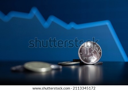 Russian ruble coins. The fall of the ruble. Collapse of the ruble. Royalty-Free Stock Photo #2113345172