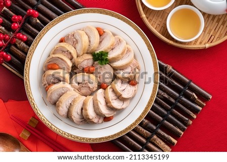 Top view of delicious sliced chicken roll soaked in Chinese wine named drunken shrimp for lunar new year's dishes. Royalty-Free Stock Photo #2113345199