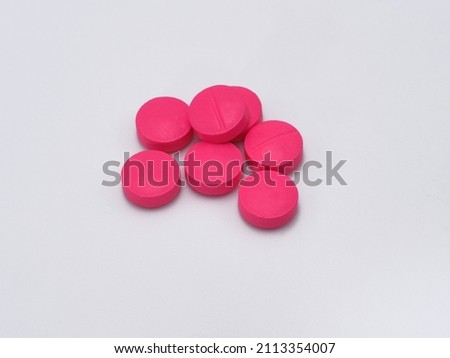 Pink pills on white background, large image, suitable for you who need high resolution. and public health work.