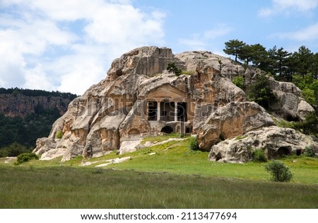 View of the rock formations and ancient rock tombs of the Phrygian valley Royalty-Free Stock Photo #2113477694