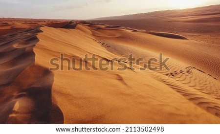Sand dunes of Wahiba sands, desert in Oman Royalty-Free Stock Photo #2113502498