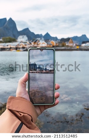 Taking photos with my smartphone in a Norwegian fishing village