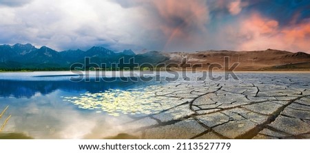 Landscape with mountains and a lake and a dried desert. Global climate change concept Royalty-Free Stock Photo #2113527779